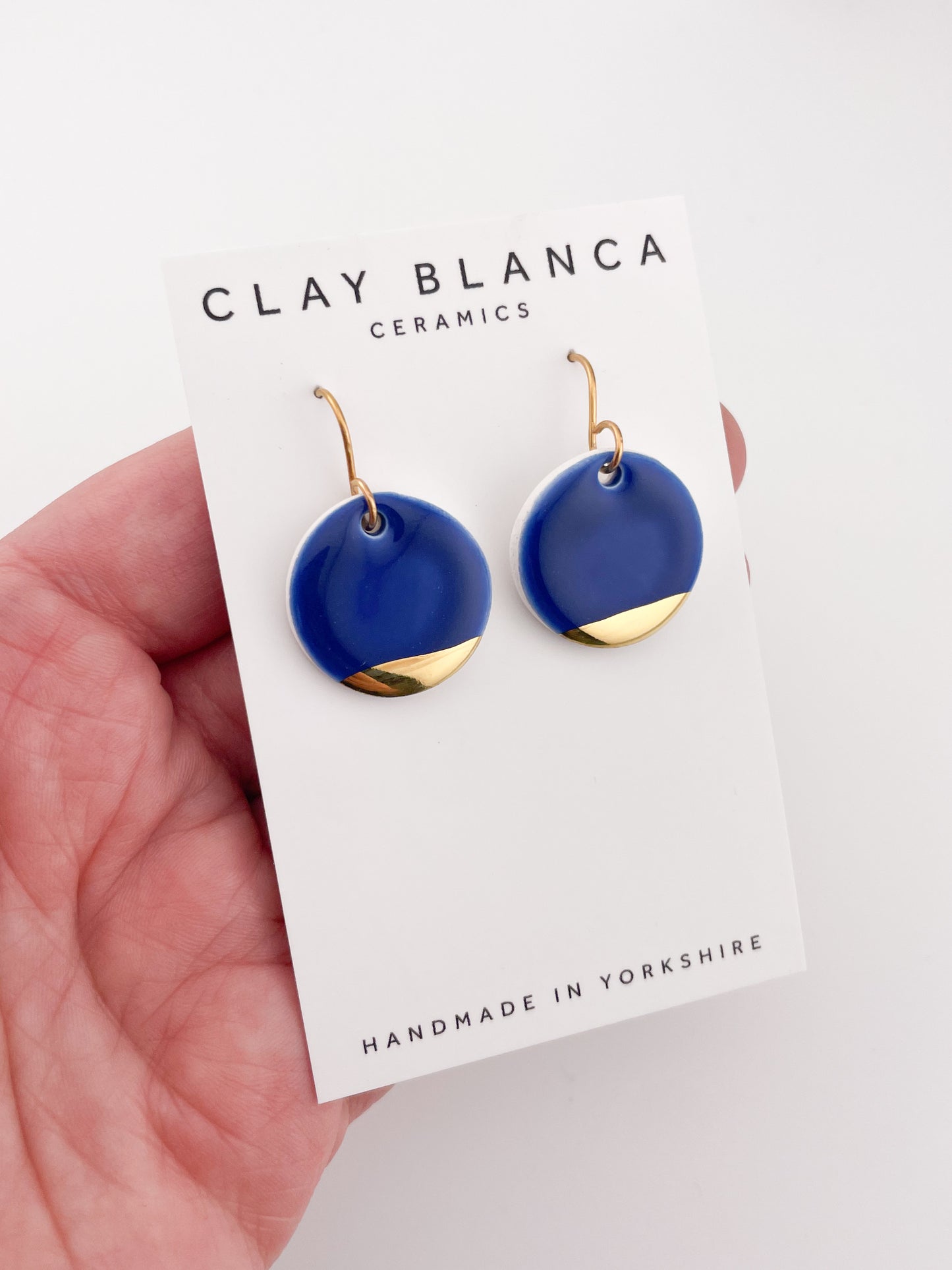 Navy blue round dangles