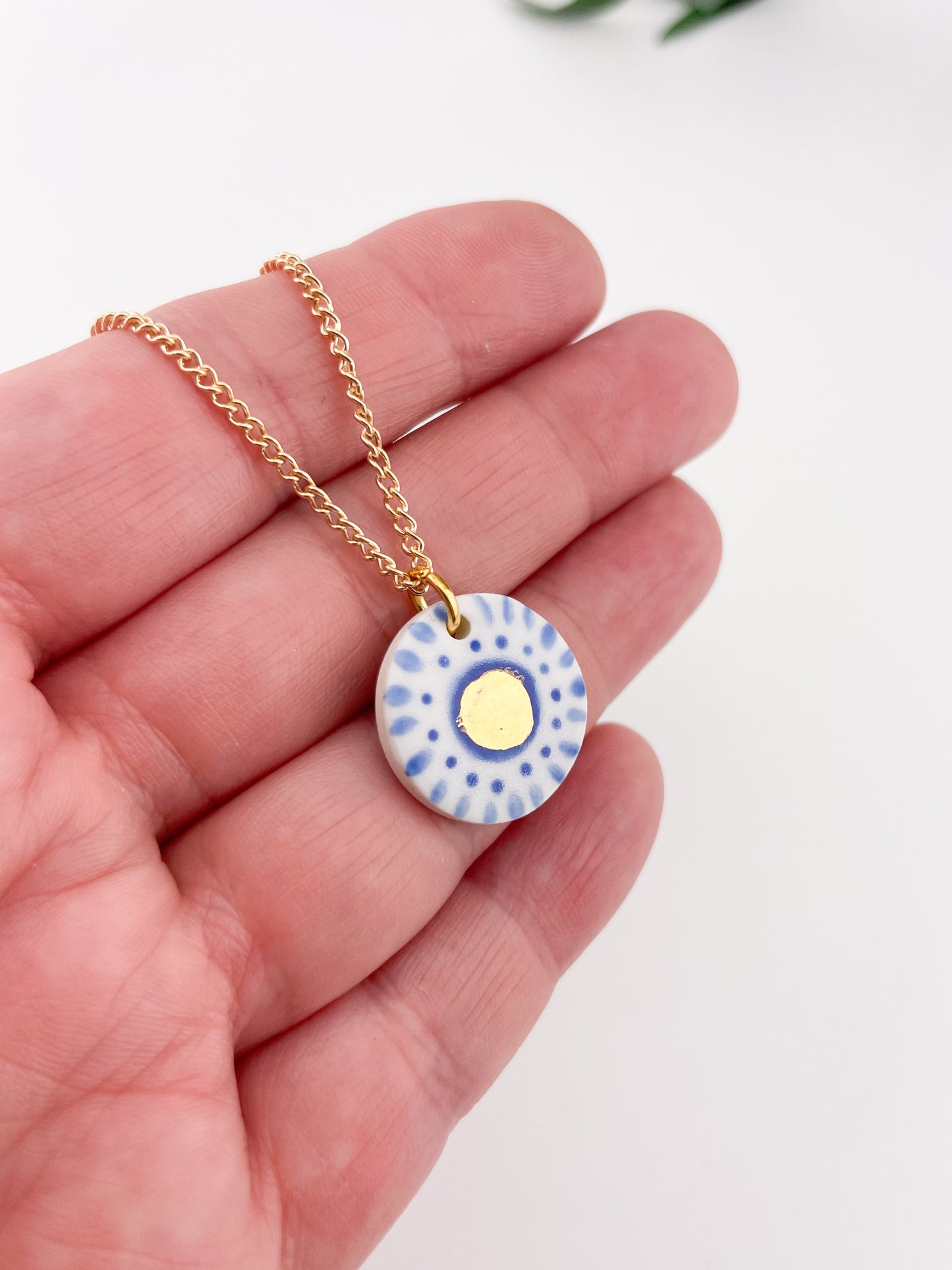 Hand painted white and blue dot pendant with gold lustre centre