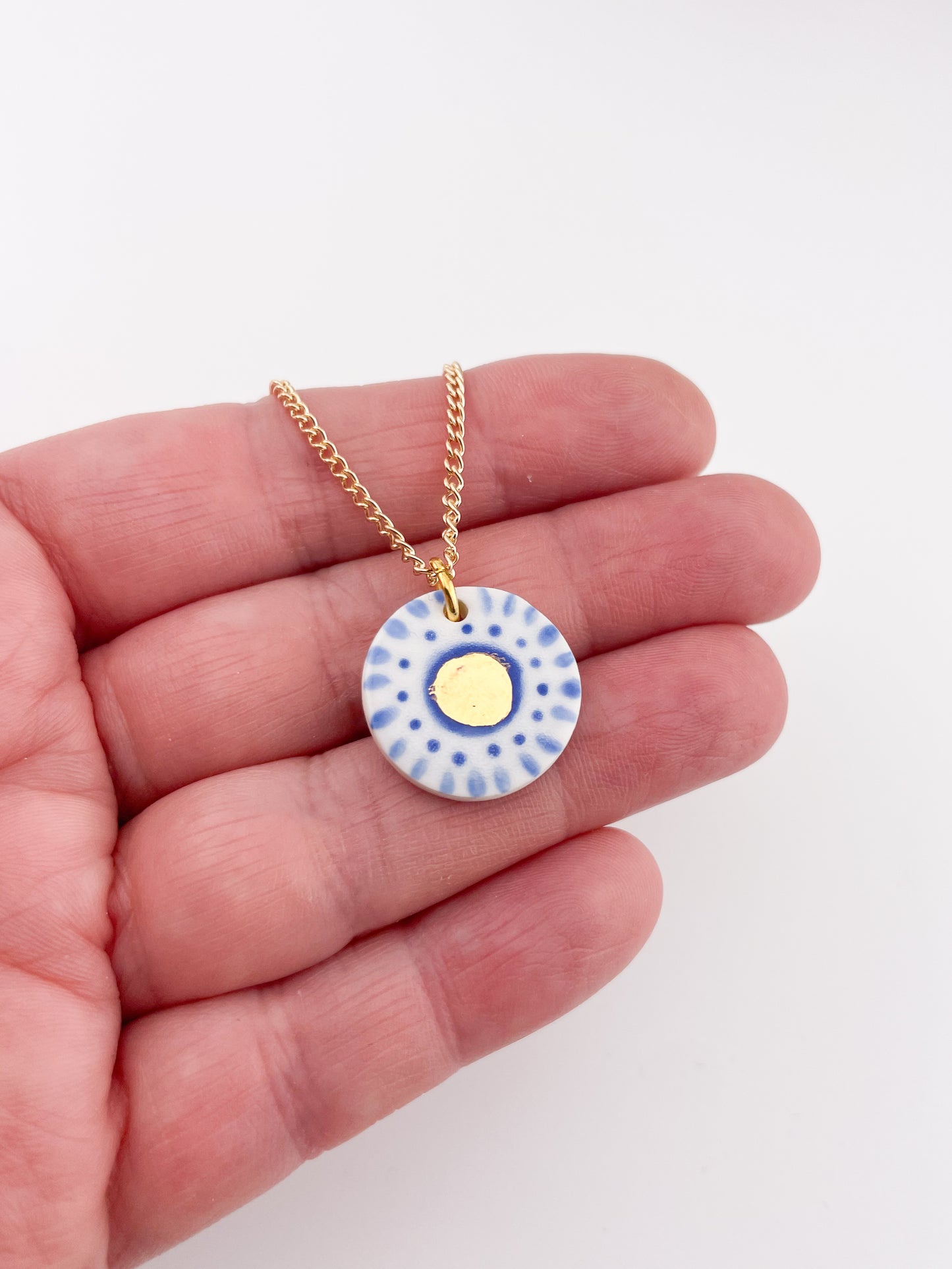 Hand painted white and blue dot pendant with gold lustre centre