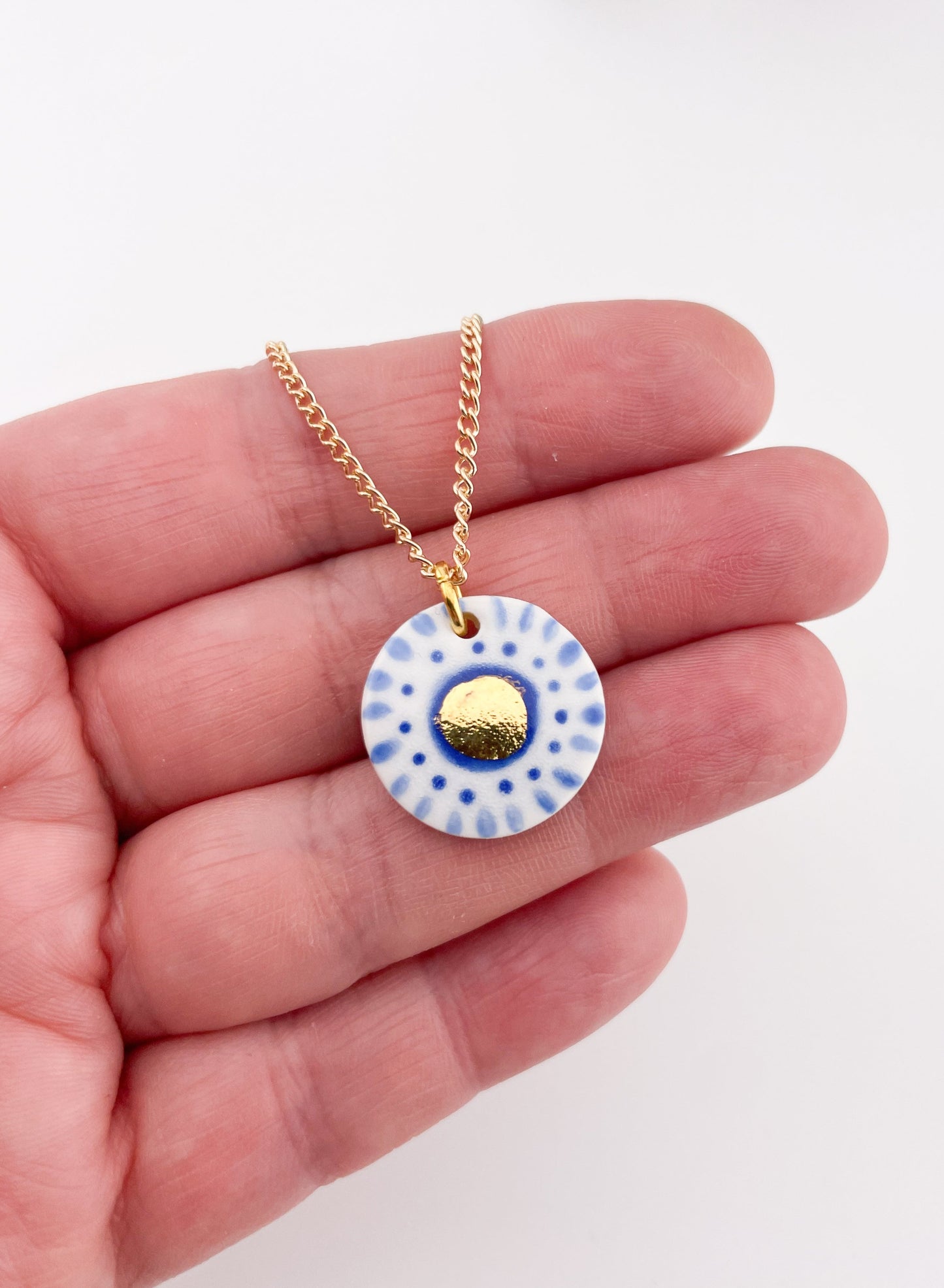 Hand painted white and blue dot pendant with gold lustre centre