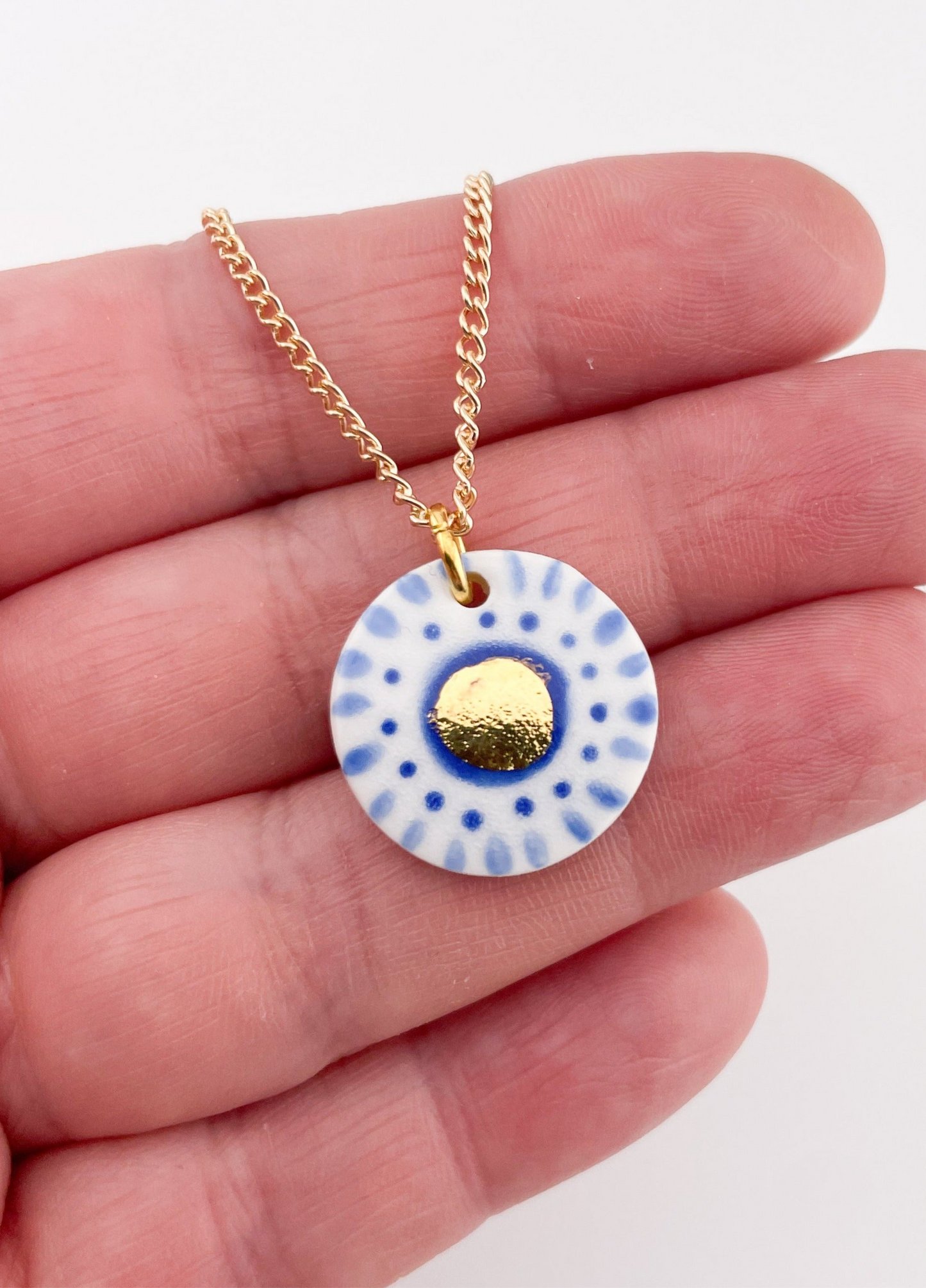 Hand painted white and blue dot pendant with gold lustre centre