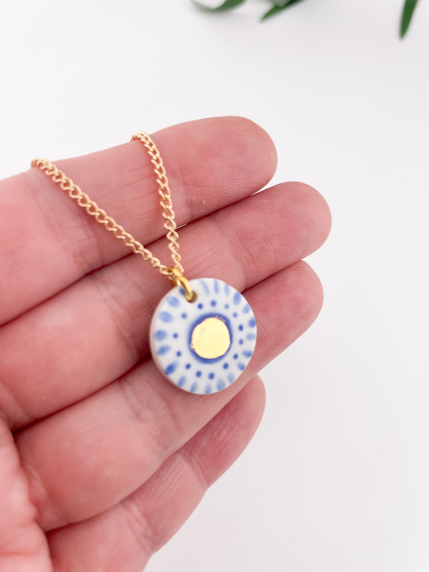 Hand painted white and blue dot pendant with gold lustre centre