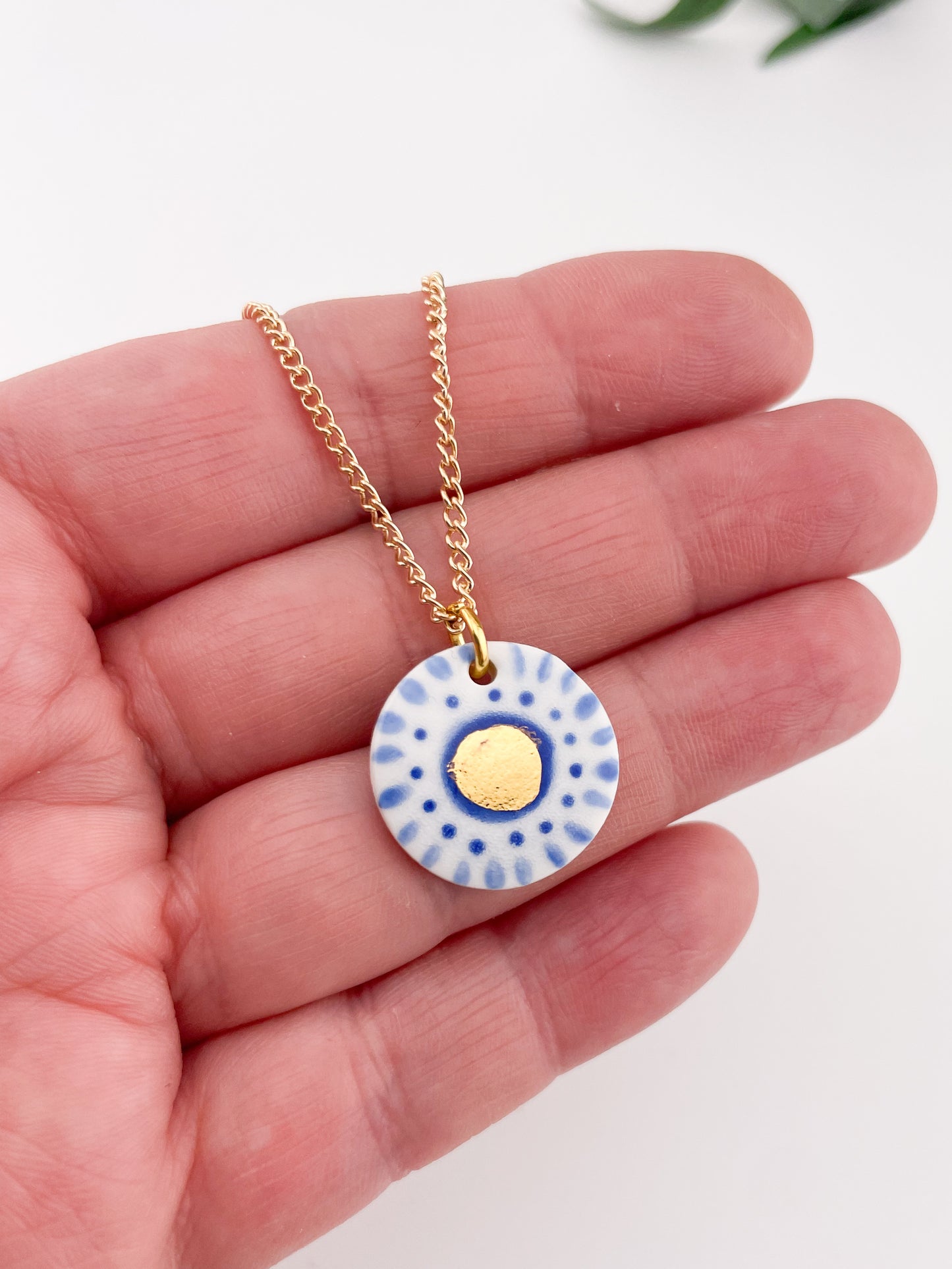 Hand painted white and blue dot pendant with gold lustre centre