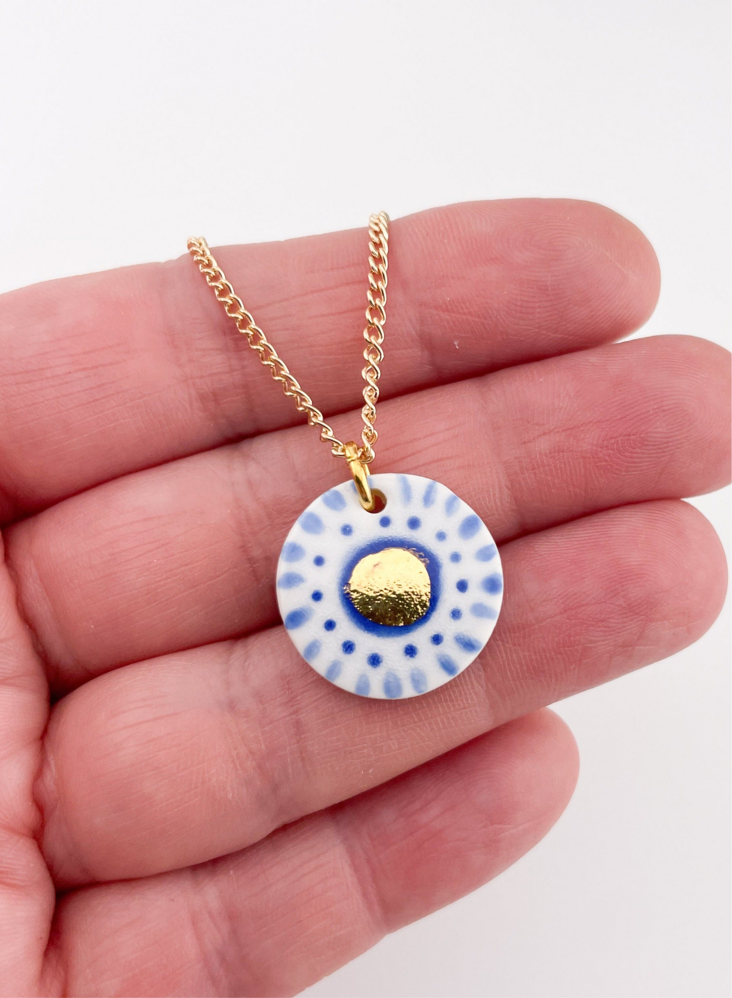 Hand painted white and blue dot pendant with gold lustre centre