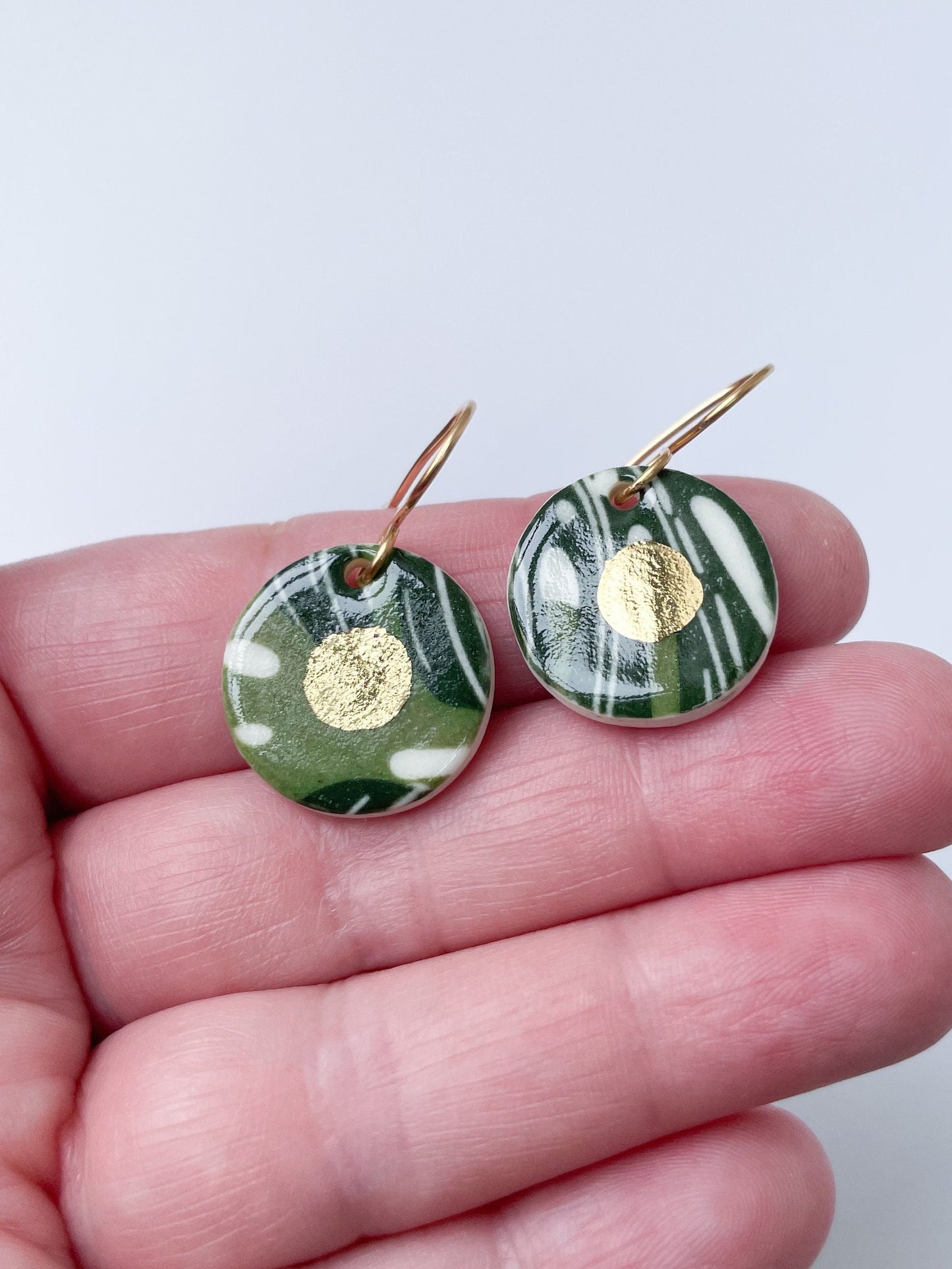 Tropical leaf pattern earrings with gold centre