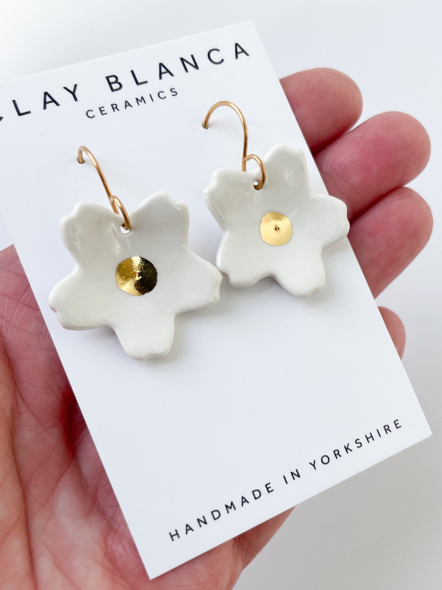 Large white flower dangle earrings