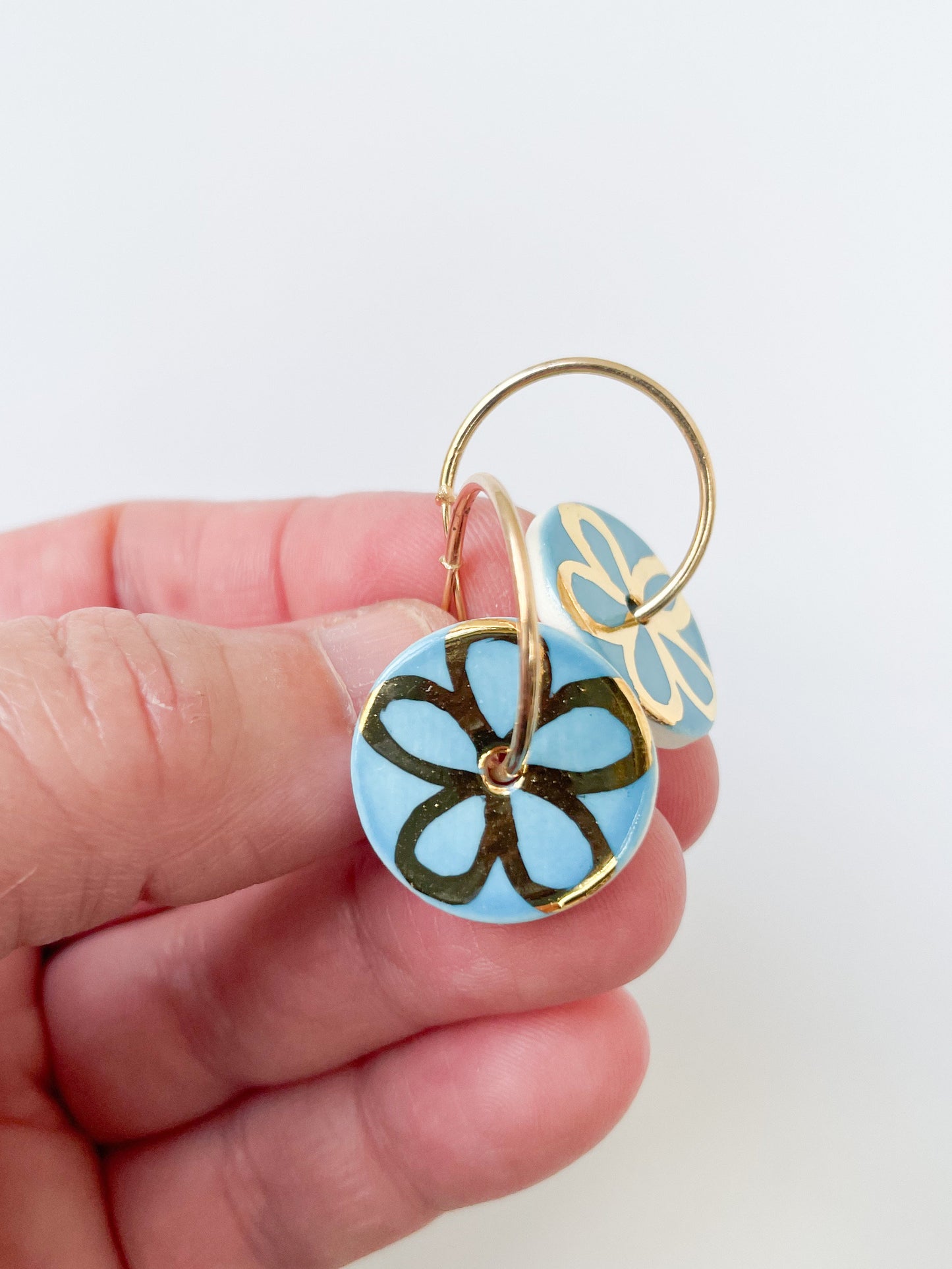 Azure Blue round dangle earrings with gold detail