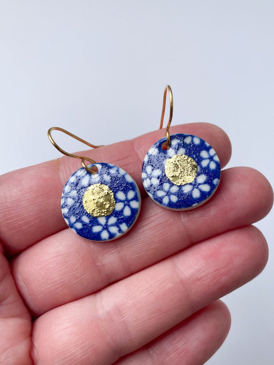 Blue earrings with white flowers pattern & gold lustre centre