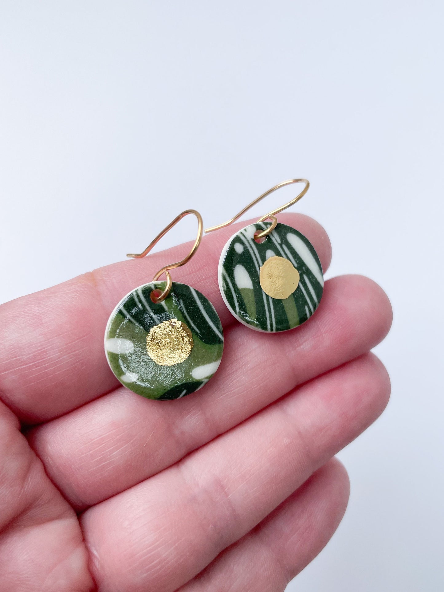 Tropical leaf pattern earrings with gold centre