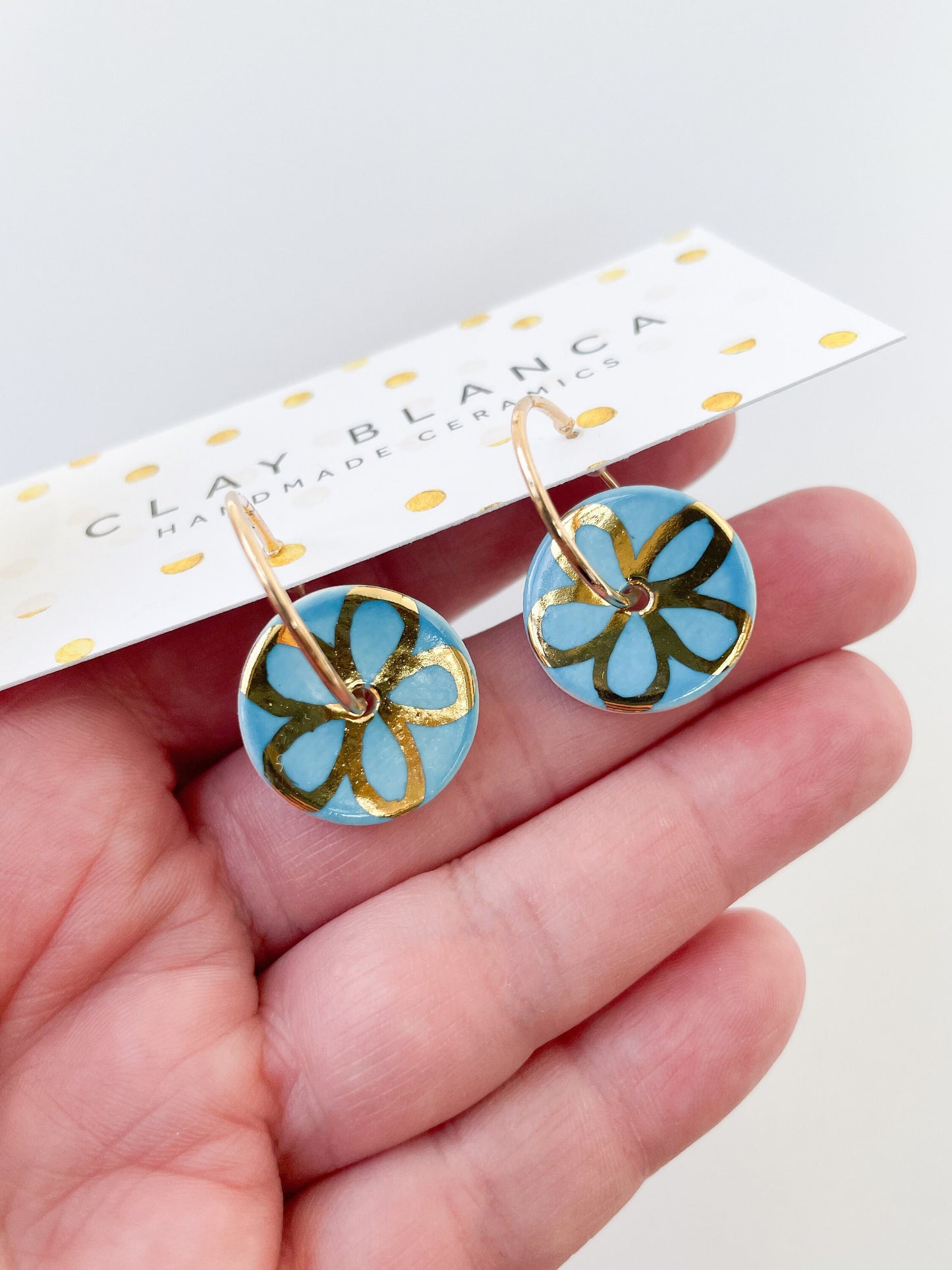 Azure Blue round dangle earrings with gold detail